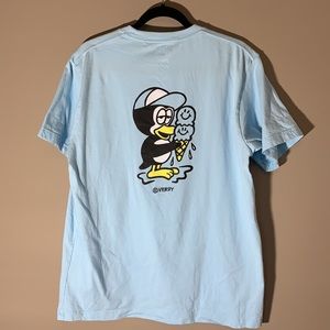 Uniqlo Tee shirt. “Rise Again” Blue. Size Medium